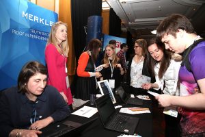 Students talking to employers at Data Talent